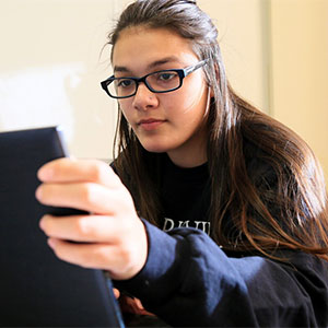 Student studies on a computer.