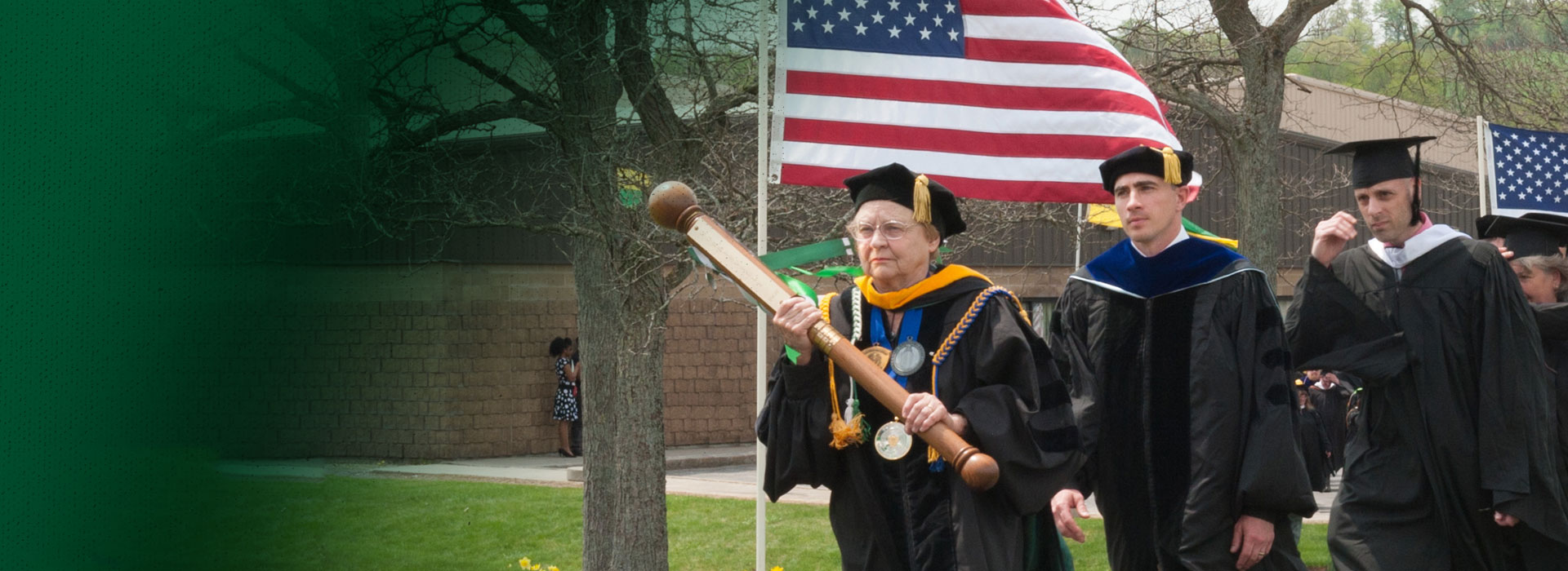 Shirley Crawford leads the college’s commencement procession.