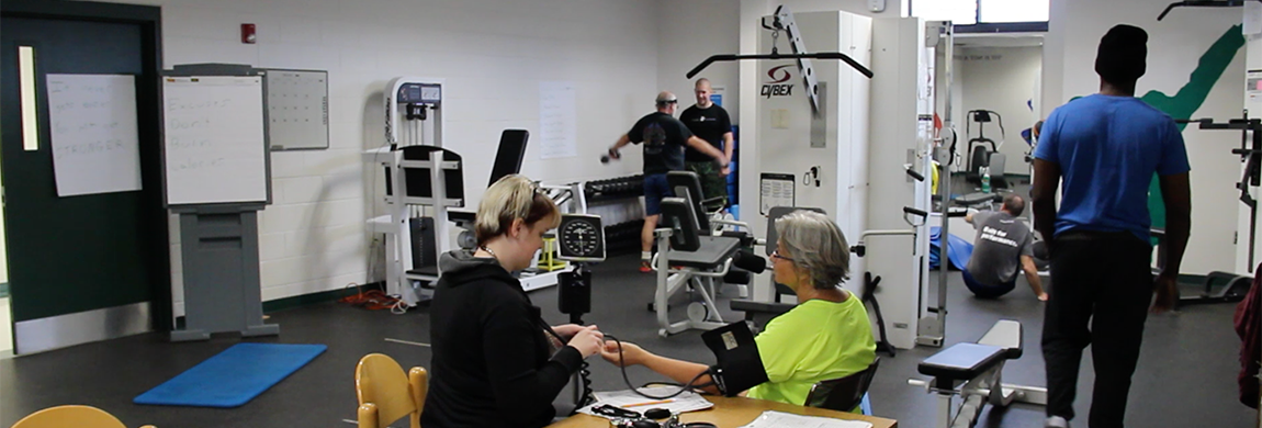 Students learning to administer physical therapy
