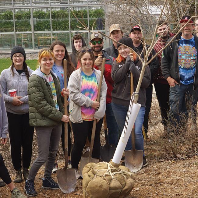 SUNY Morrisville students plant a tree