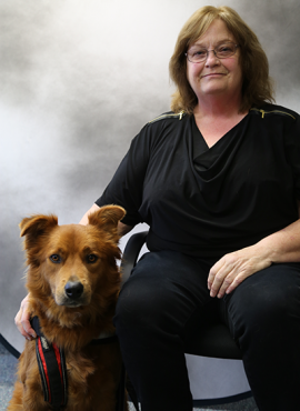 Clare Armstrong-Seward and her service dog